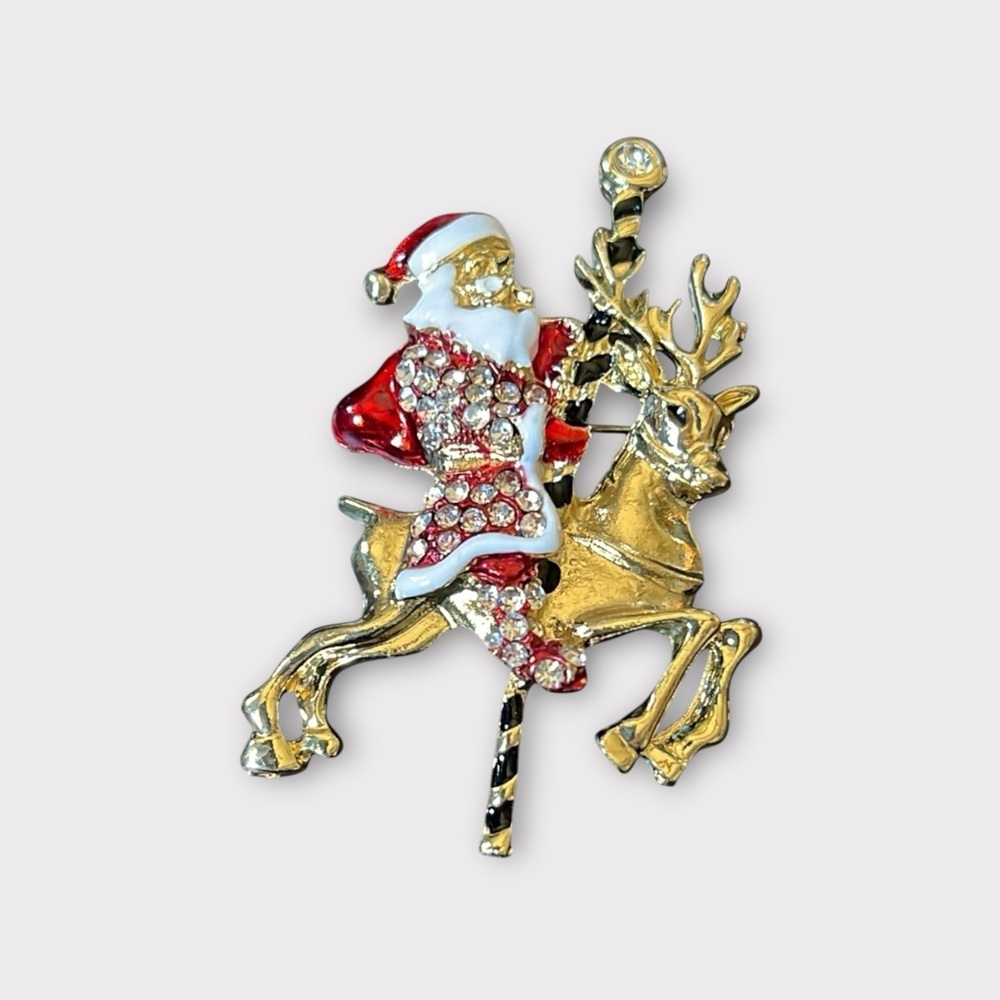 Beautiful Santa on a Carousel Horse. Gold tone, enamel, crystal